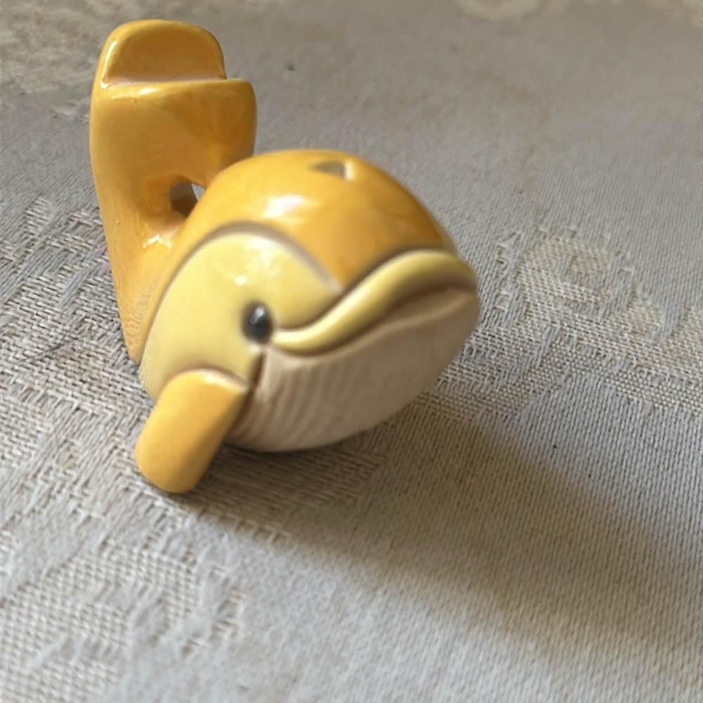 Retired Artesania Rinconada clay dolphin figurine, signed by artist